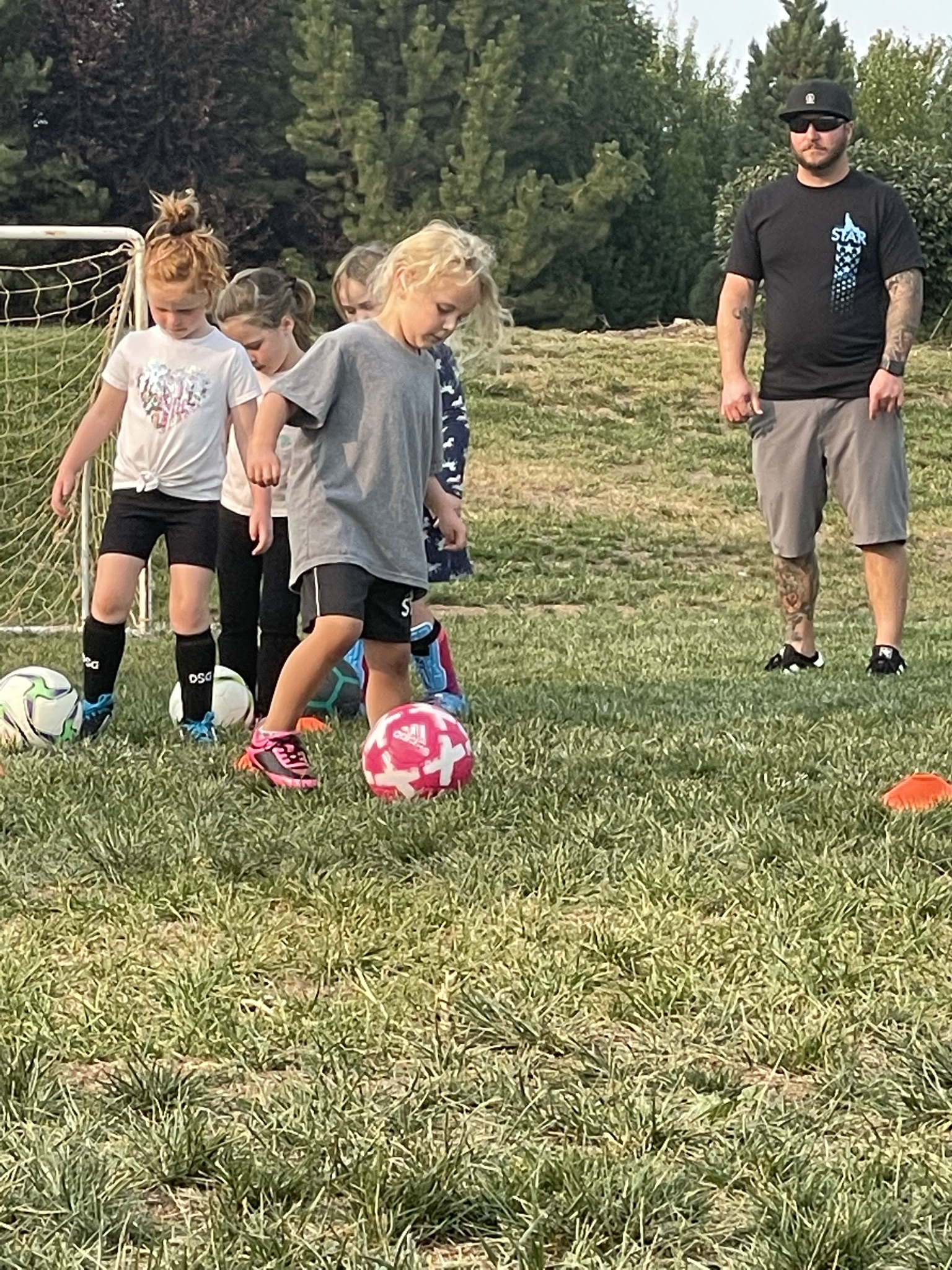Grace at practice with her coach