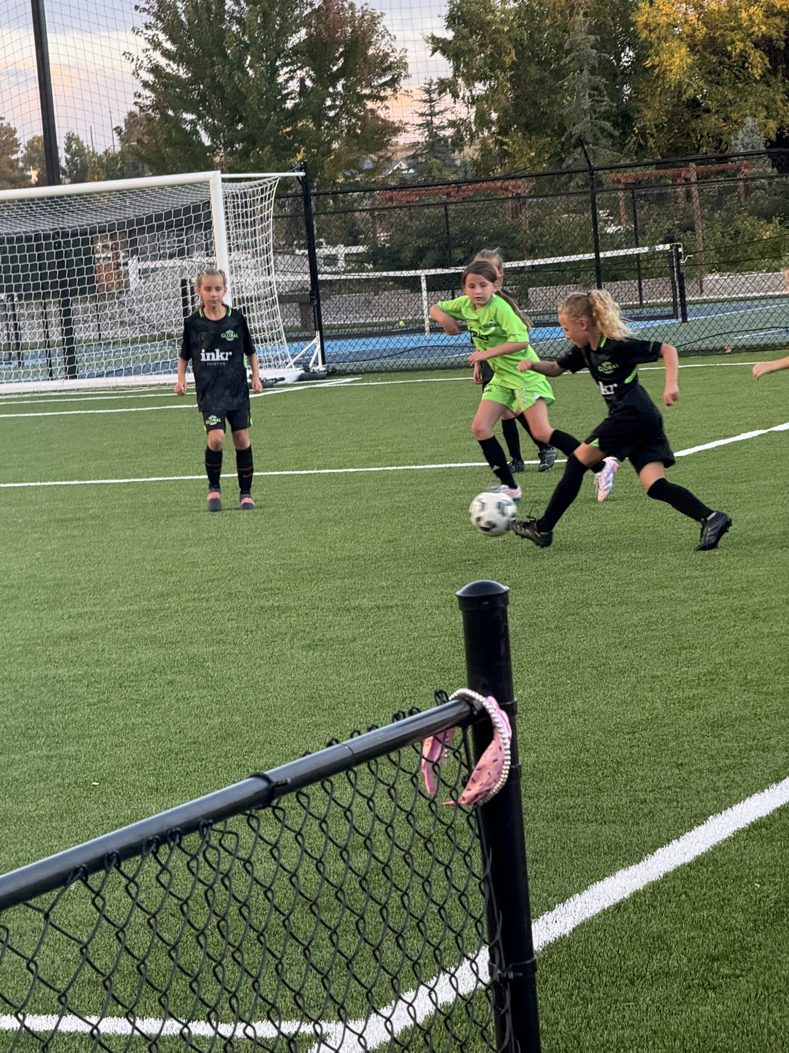 Grace in competitive action on a turf field